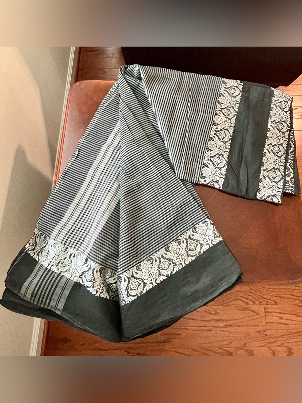 Elegant Black & White Striped Saree with Floral Border